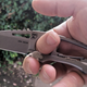 Illustration for article titled This Knife's Sheath Folds To Become Its Handle